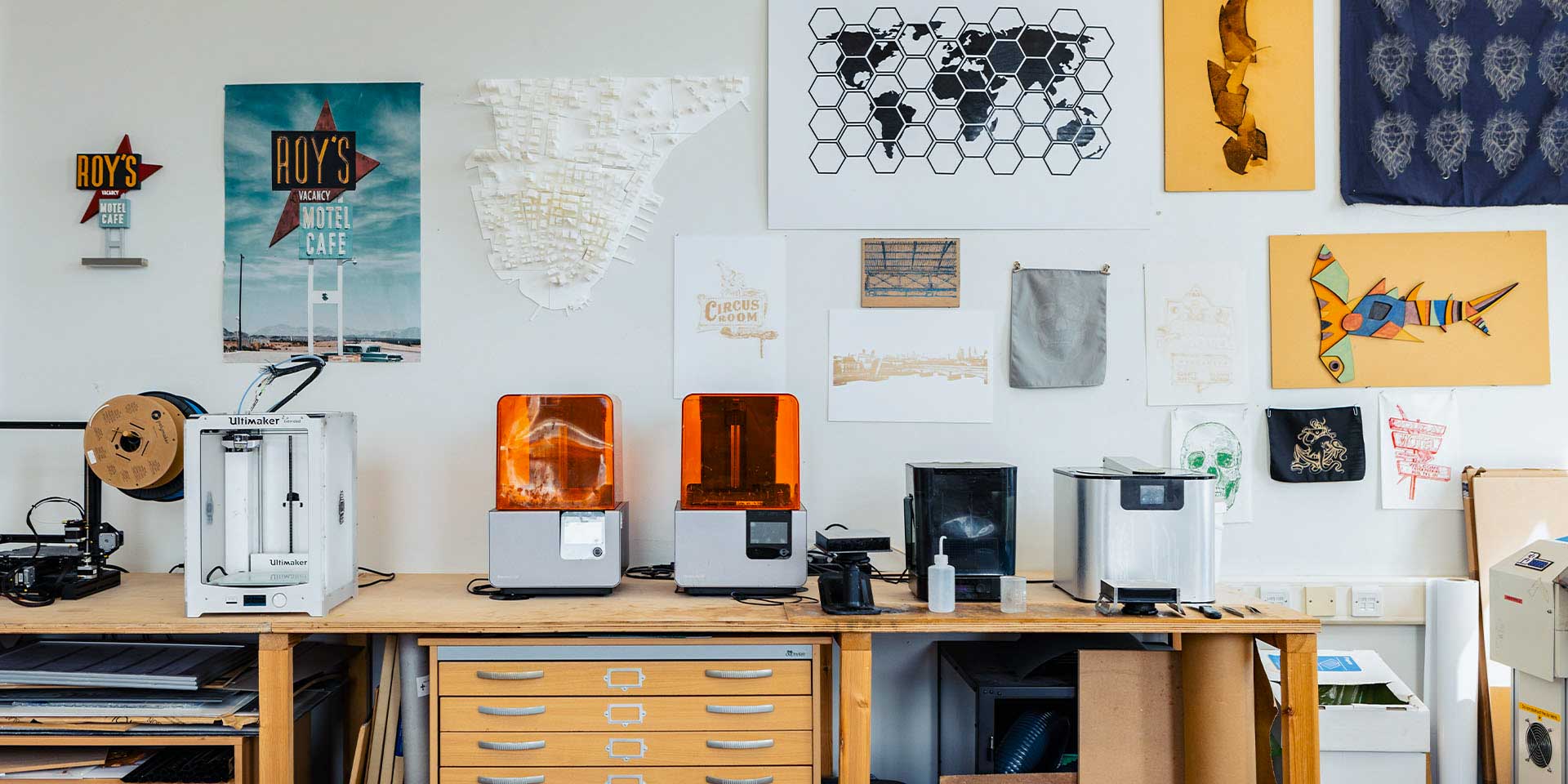 3D printing and laser cutting equipment in a digital fabrication laboratory.